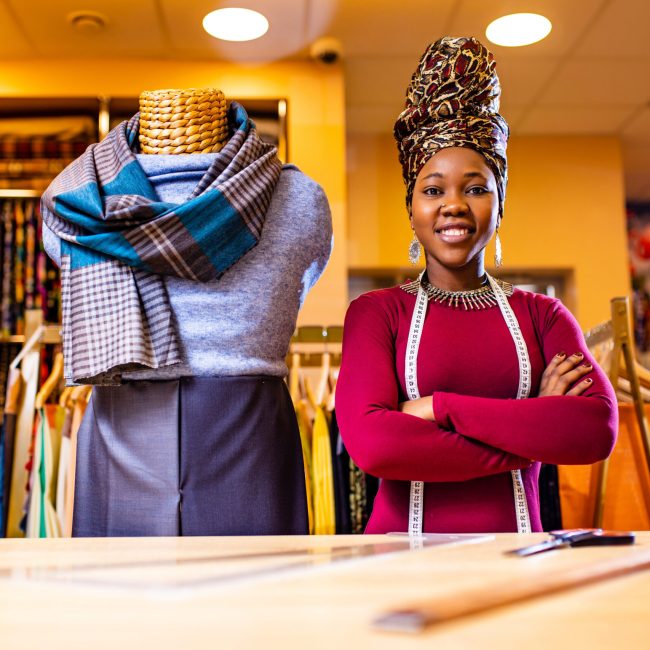 authentic ethnic africa america sellerwoman working in shop .